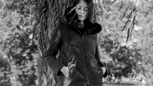 Model by Willow Tree wearing Herno coat with hood and fur