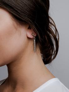 Female model wearing earring by Rene Escobar