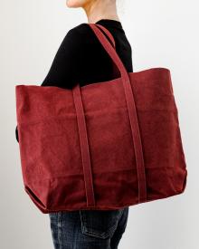 Woman model holding red Amiacalva Canvas Tote