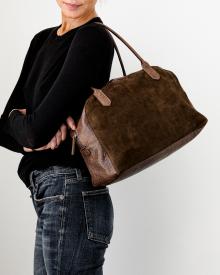 model wearing b may handbag