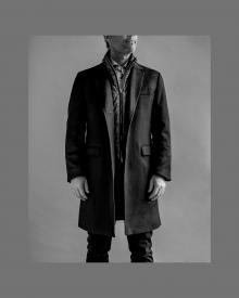 male model wearing herno system coat.