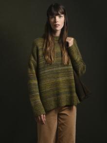 Model wearing Co Sweater