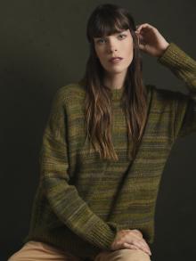 Model wearing Co Sweater